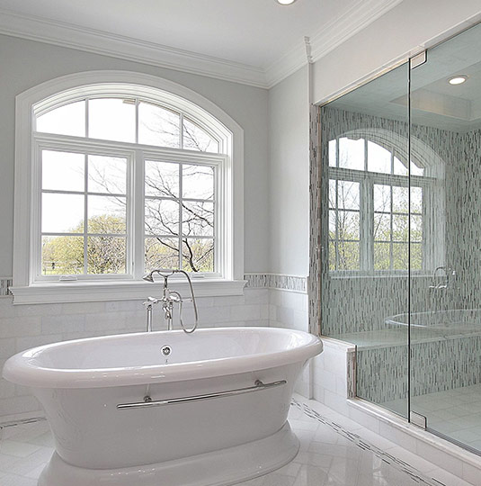 Retro white bath tub with modern shower