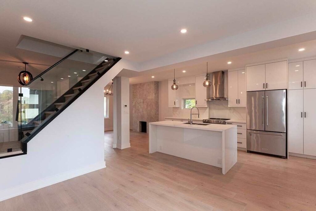 Open main floor with glass stair railing