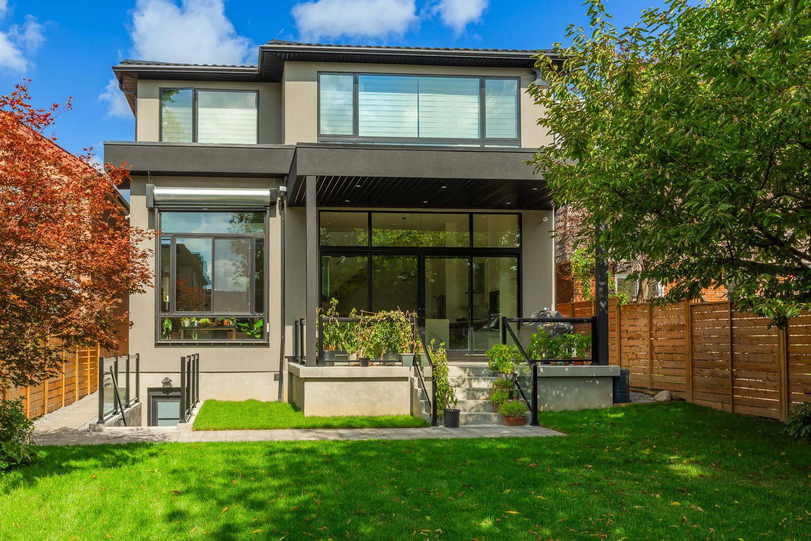 Rear exterior and backyard of the new home