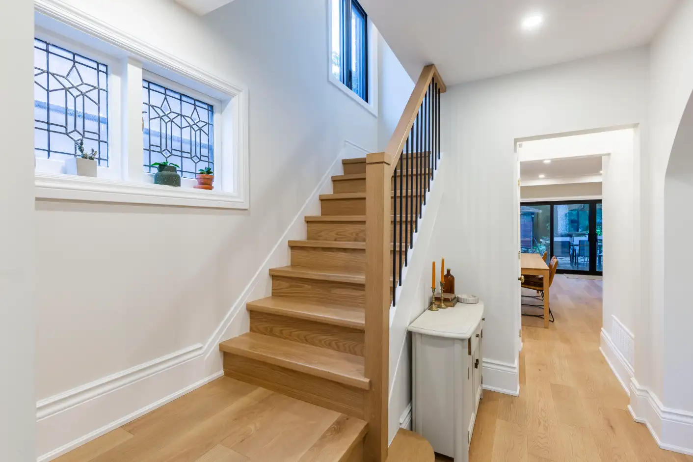 New oak staircase with original leaded glass windows