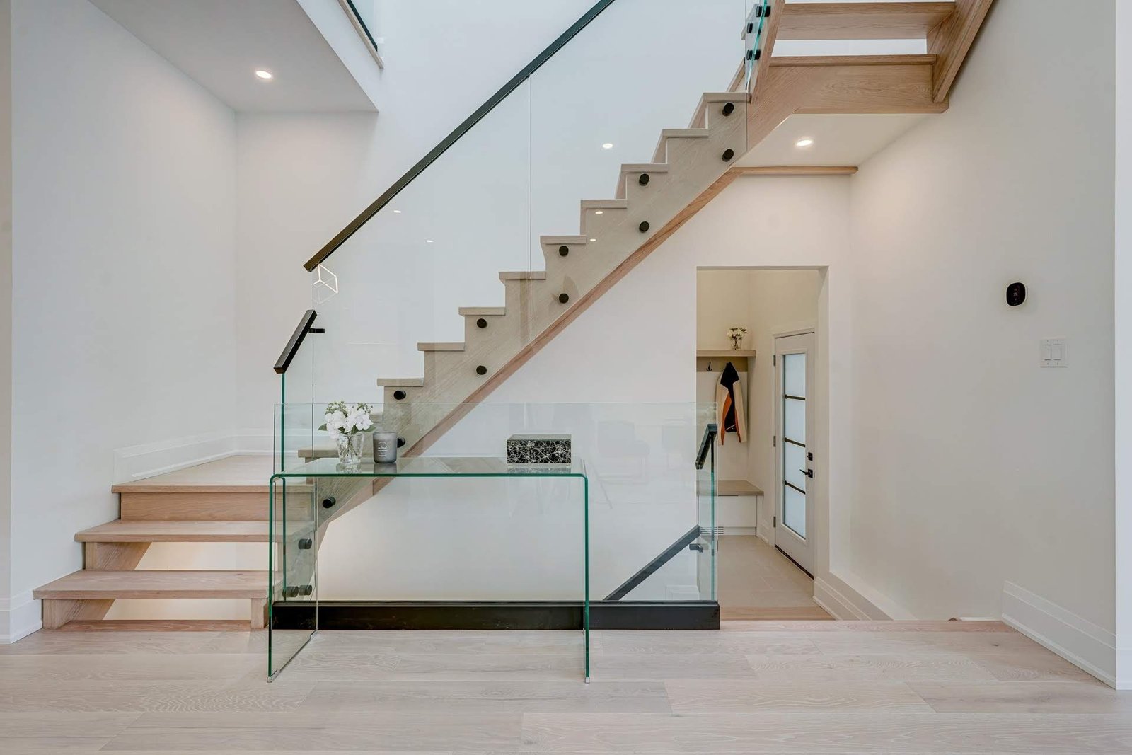 Floating stairs with glass railing