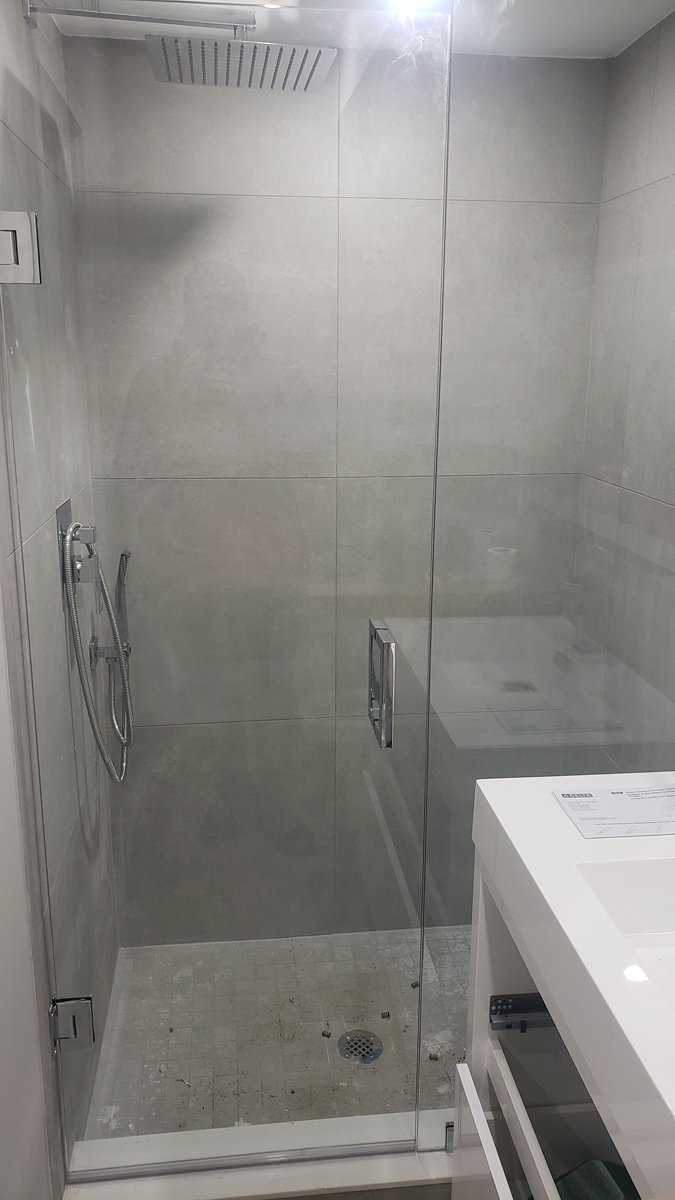 Glass shower with rain shower head