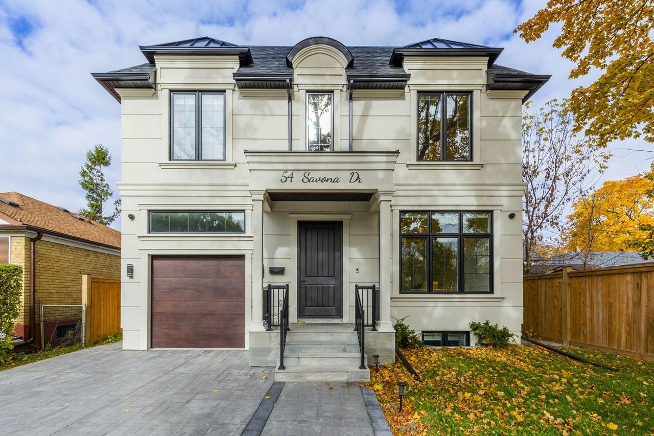 Traditional design build new home front elevation with single car garage at 54 Savona Drive, South Etobicoke