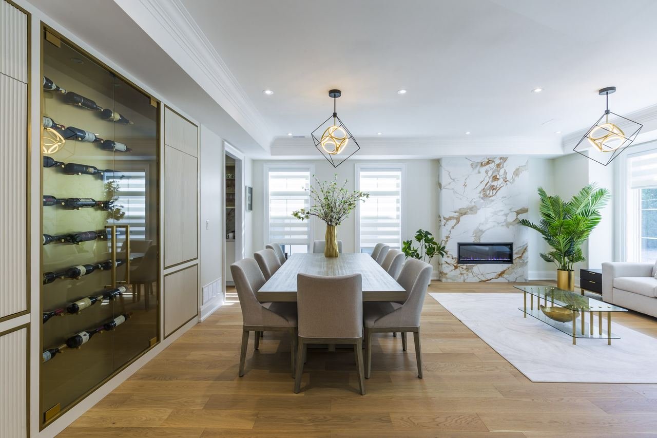 Dining room with built-in wine display and marble feature wall