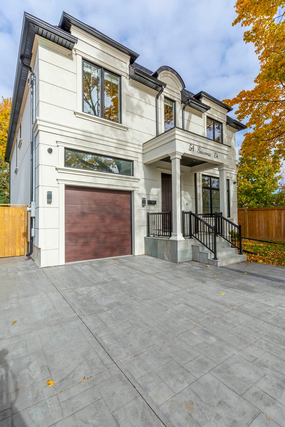 New home front angle with driveway — 54 Savona Drive