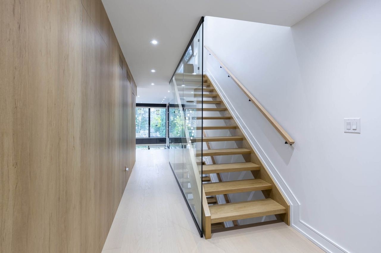 Wood stairs with glass railing