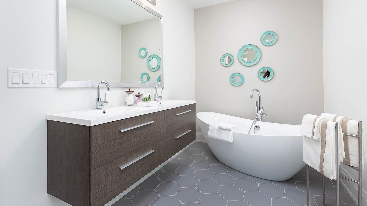 Bathroom with freestanding tub and floating double vanity