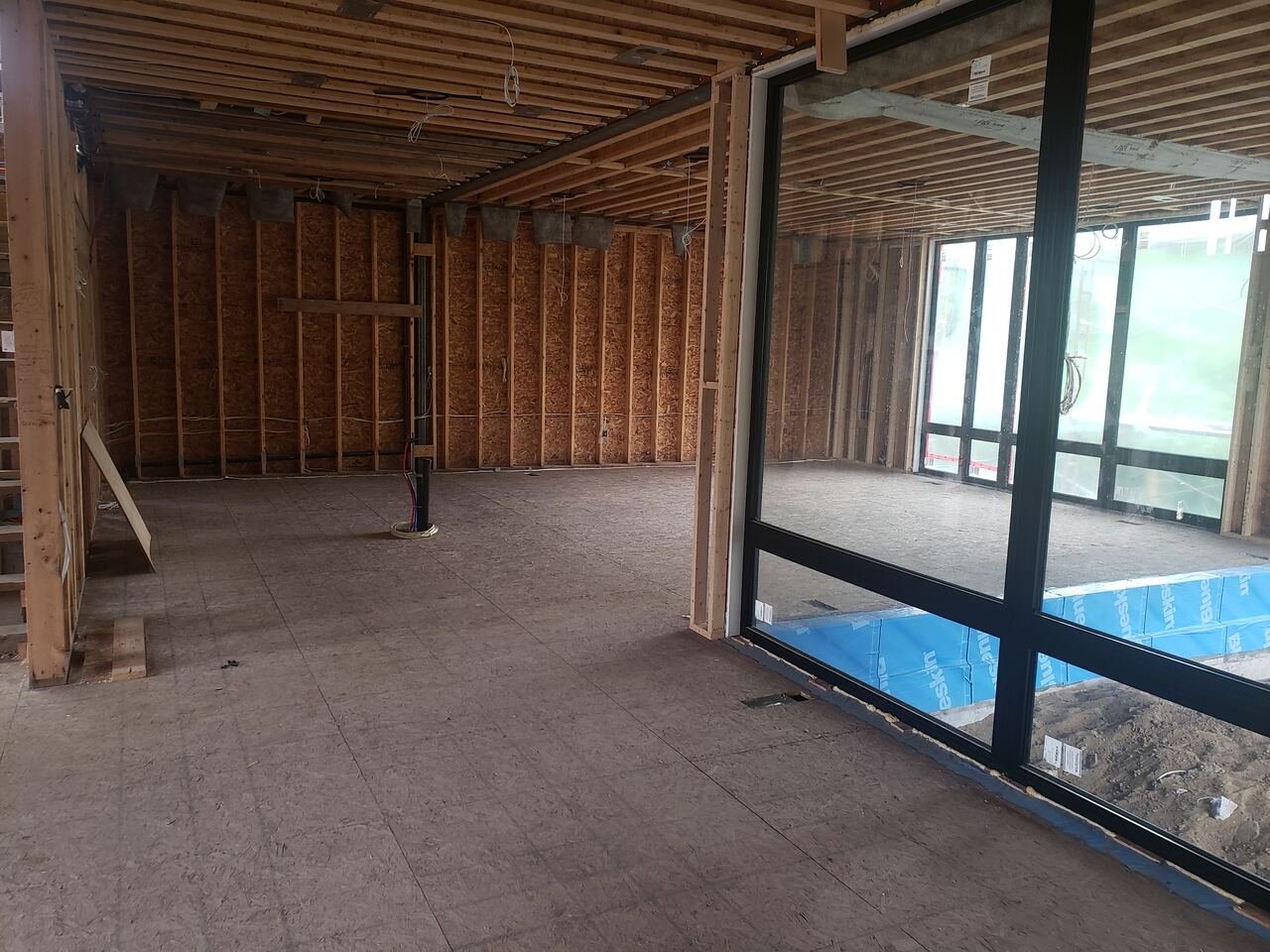 Framing stage looking toward the rear glazing and walkout