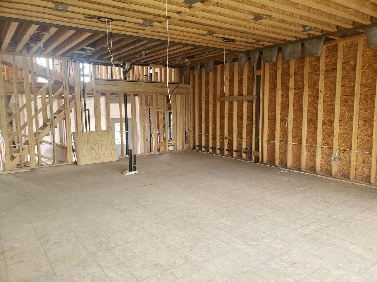 Wide view of the main floor framed with subfloor down