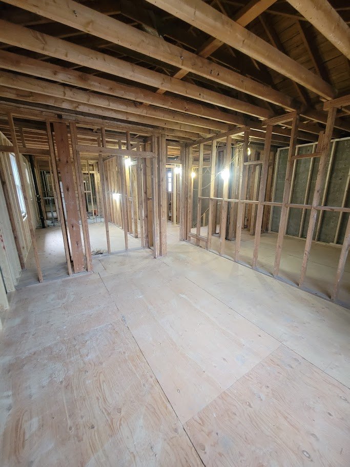 Stairwell stripped to block walls and floor joists during demolition