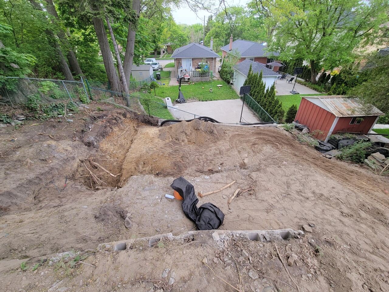 Backyard excavation and grading during construction