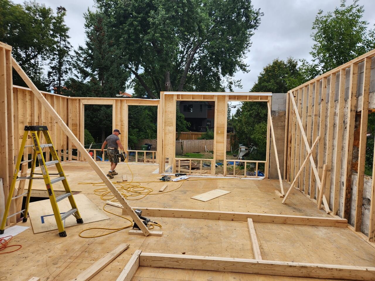 Main floor framing with window openings and temporary bracing in place