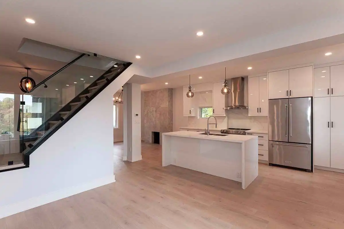 Open main floor with new stairs and kitchen