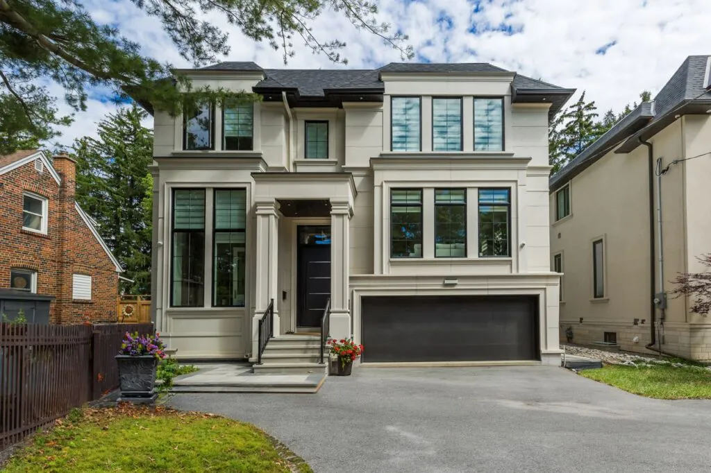 New custom home front elevation with double car garage — 50 Laurelcrest, North York