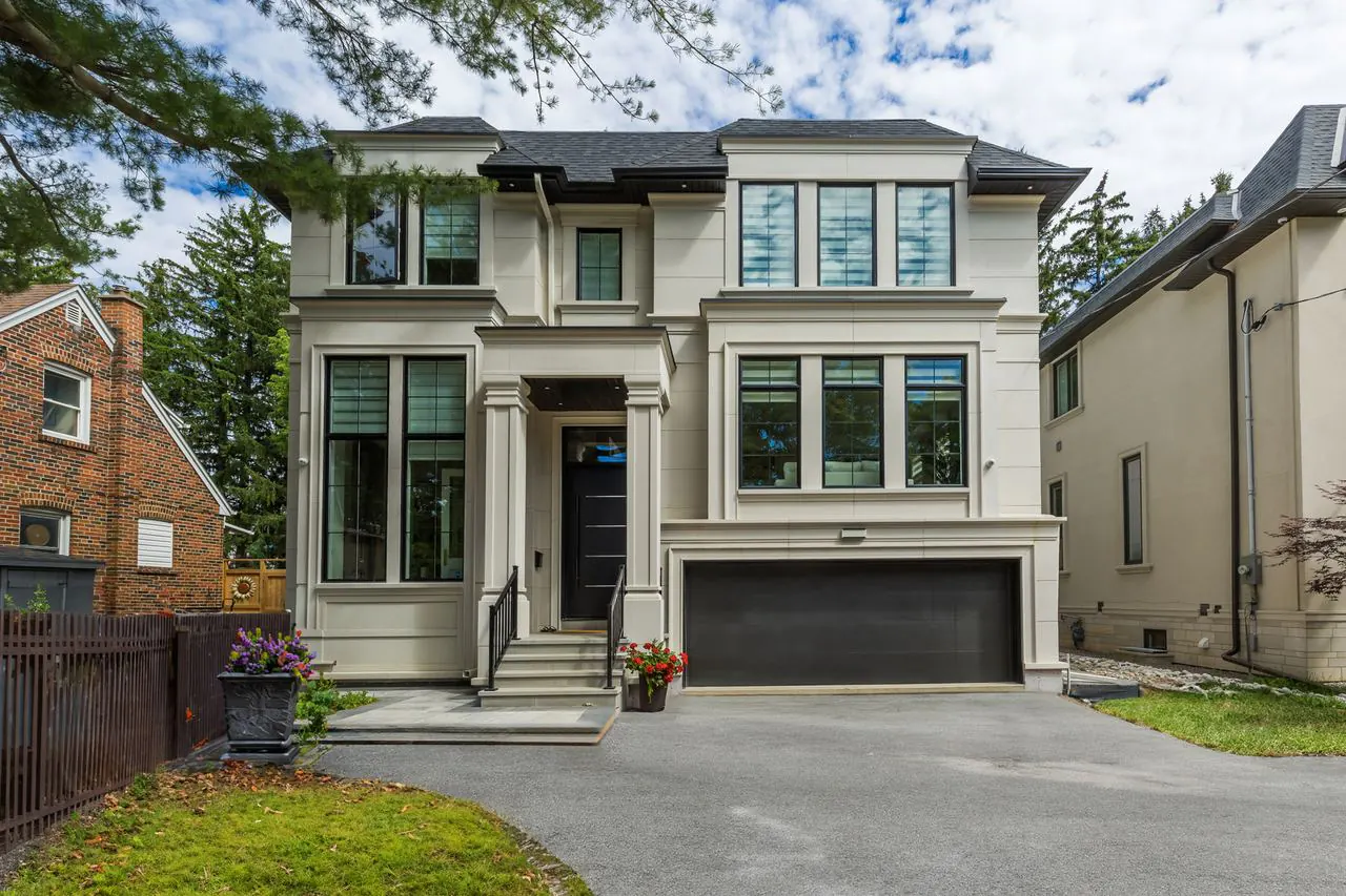 New custom home front elevation with double car garage at 50 Laurelcrest, North York