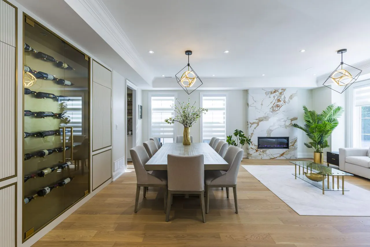 Dining room with built-in wine display and marble feature wall