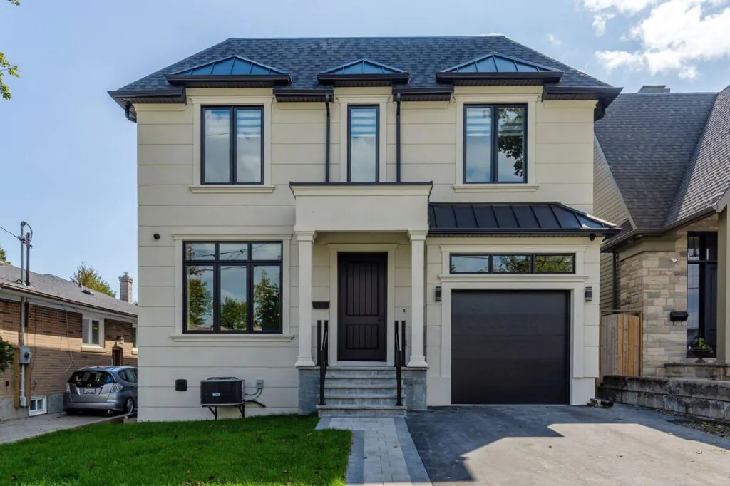 Traditional design-build new home front elevation with single car garage — Cloverhill Rd, South Etobicoke