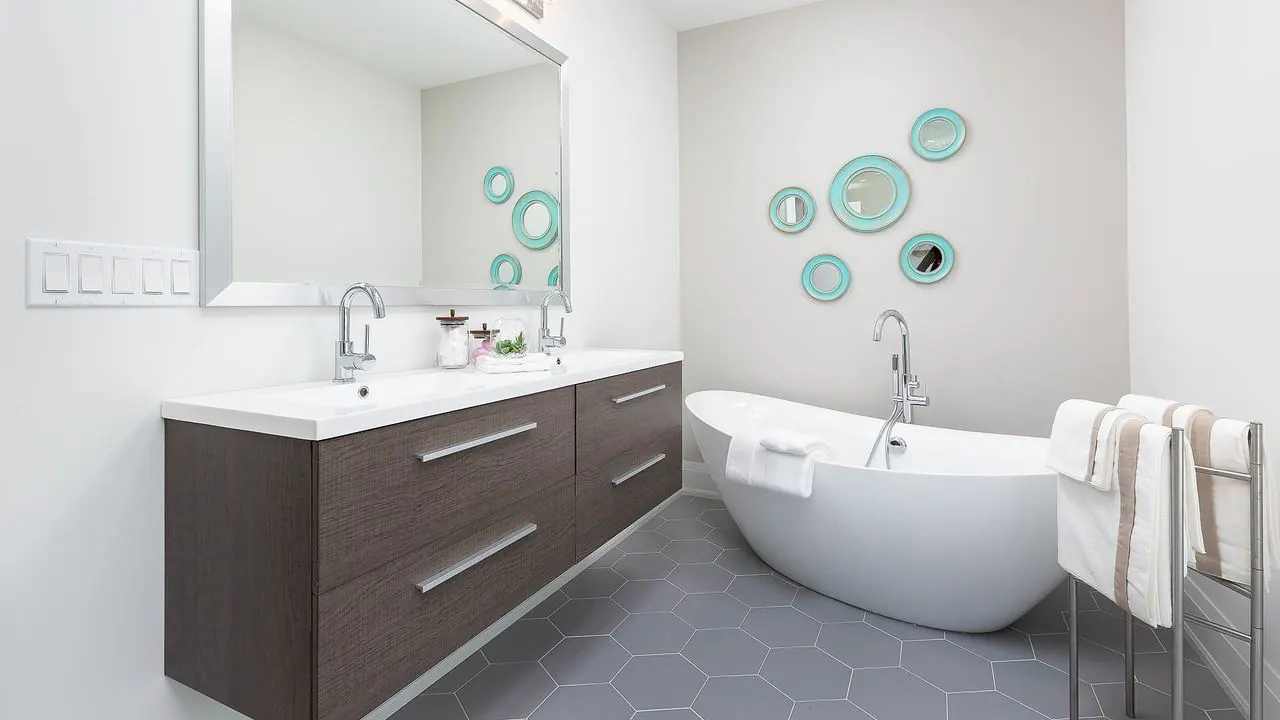 Bathroom with freestanding tub and floating double vanity